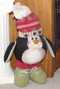 A cheery--but fat--penguin all bundled up for winter!